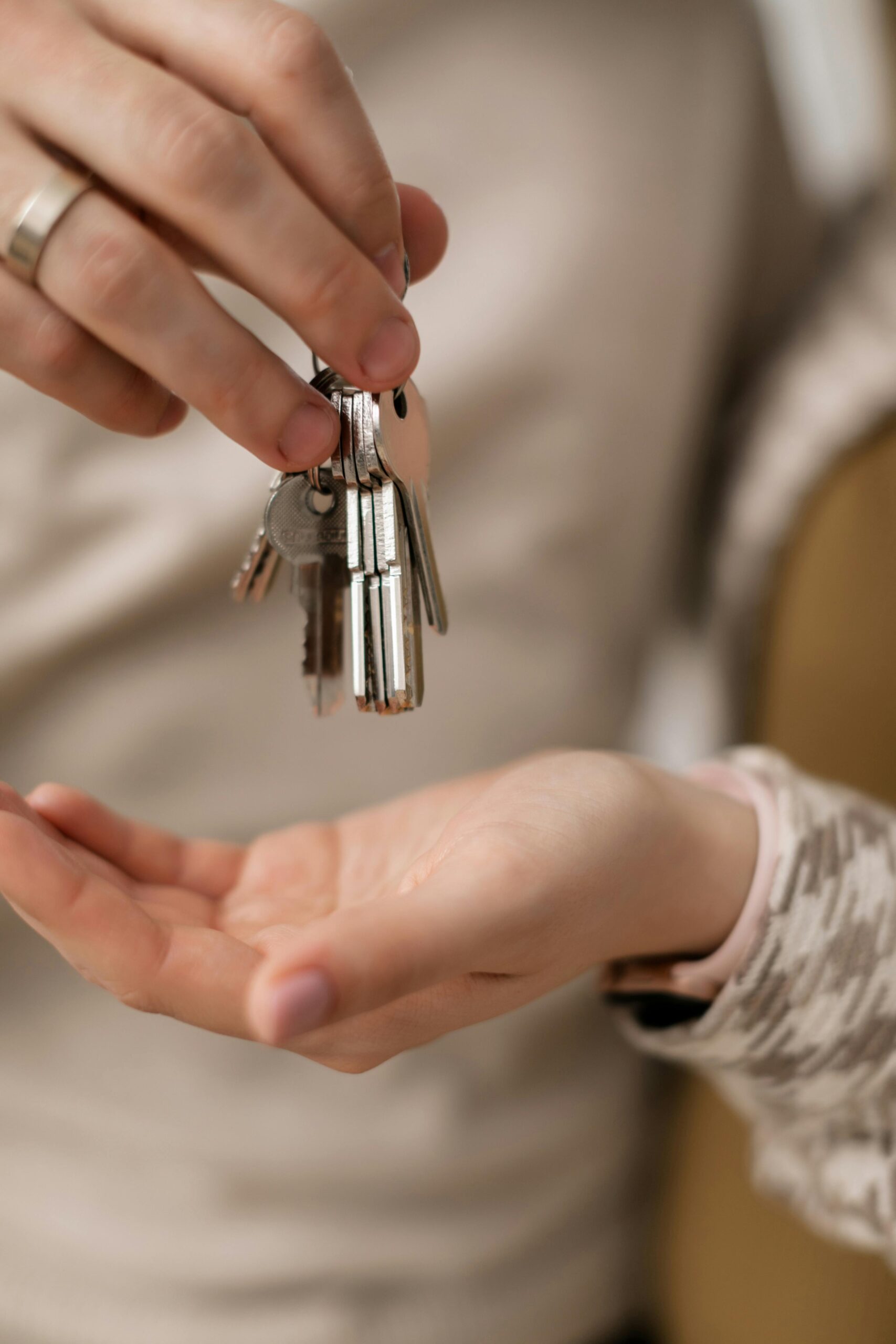 handing over keys to home